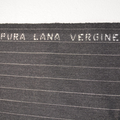 100% WOOL · Suiting