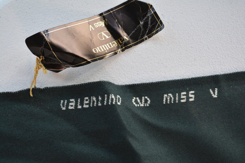 100% WOOL · Gabardine