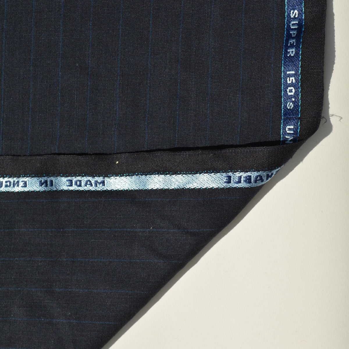 British Super 150s Wool Suiting | Gray with Blue Stripes | Made in England Classic Tailoring Fabric | By the Yard