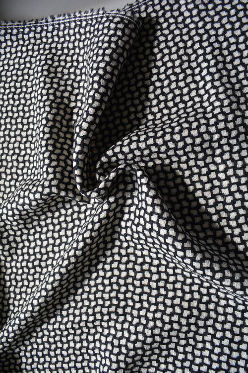 100% WOOL · Suiting